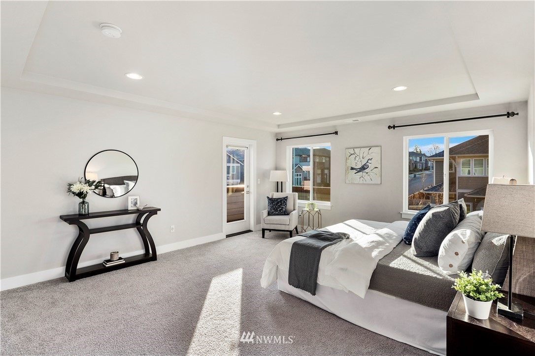 7 176th Place Southeast Bothell, WA 98012 - Photo 25 of 40 a bedroom with furniture and a potted plant