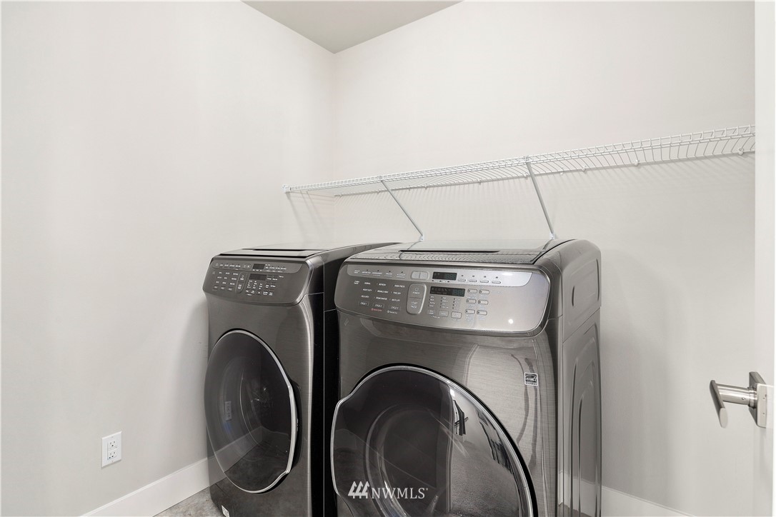 7 176th Place Southeast Bothell, WA 98012 - Photo 32 of 40 a utility room with dryer and washer