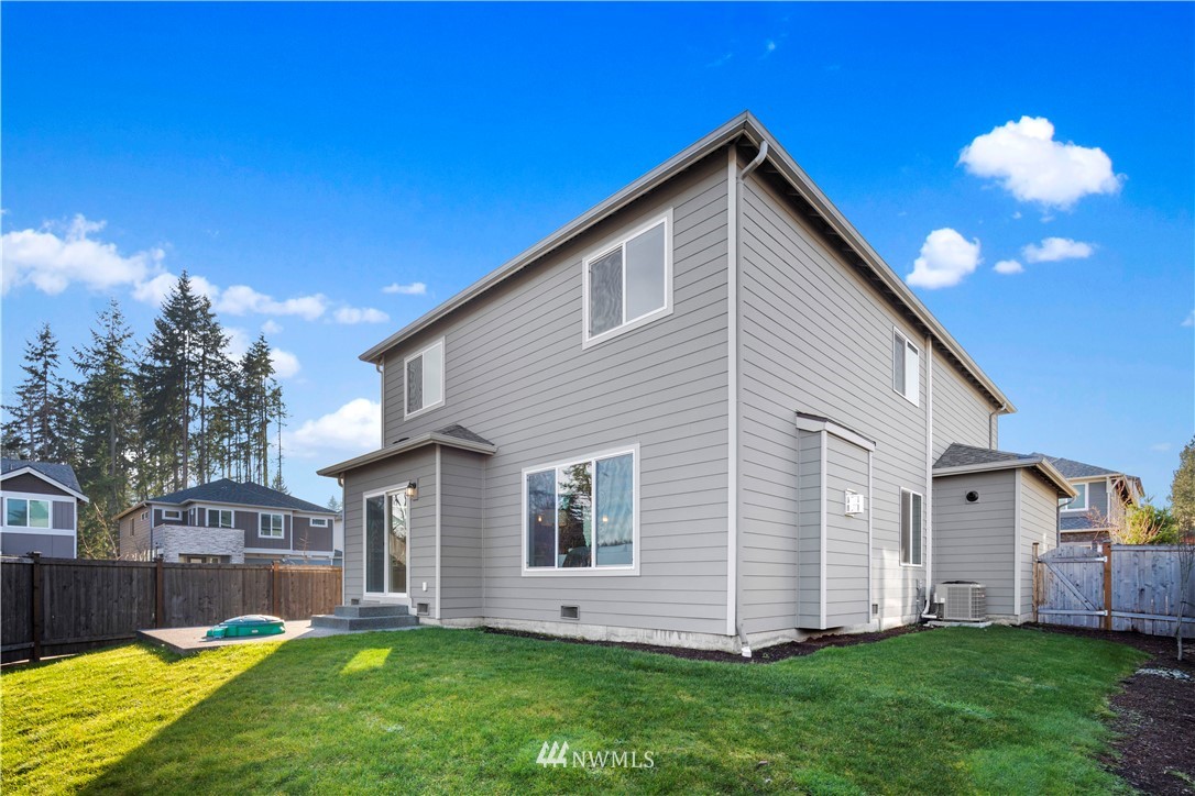 7 176th Place Southeast Bothell, WA 98012 - Photo 36 of 40 a front view of house with yard