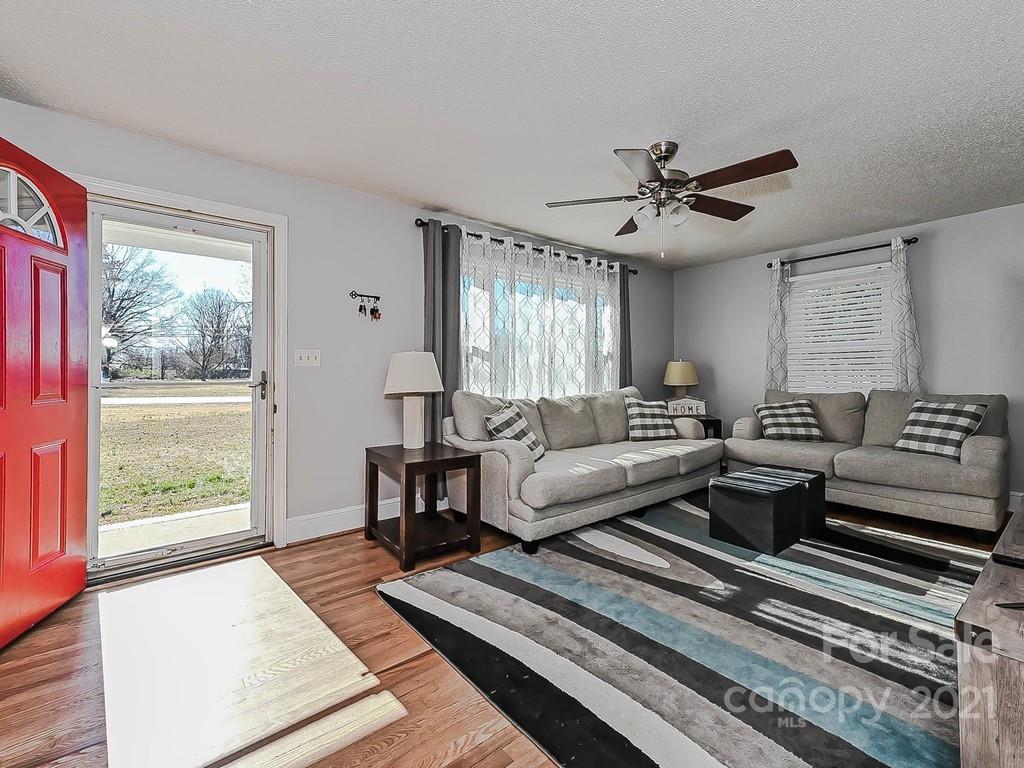 408 West Sandy Ridge Road Monroe, NC 28112 - Photo 2 of 21 a living room with furniture and a window