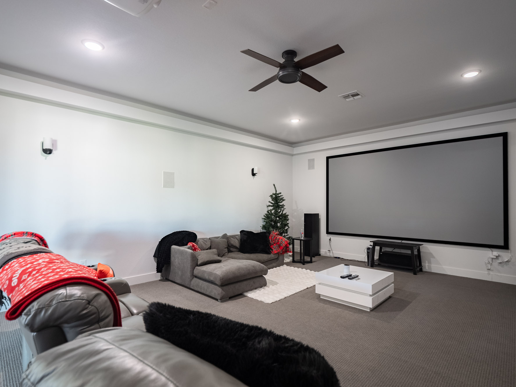 14900 Copper Ridge Lane Austin, TX 78734 - Photo 16 of 39 Carpeted cinema room with ceiling fan and recessed lighting