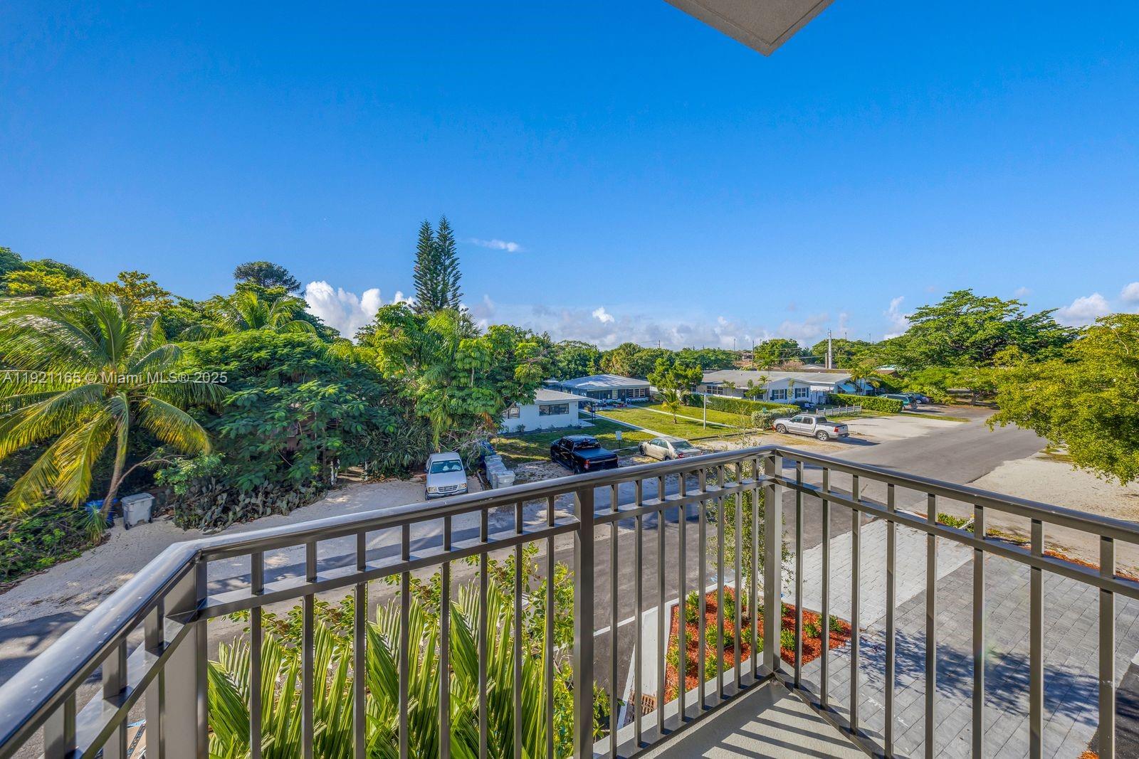 20 Northeast 19th Avenue, Unit 201 Pompano Beach, FL 33060 - Photo 17 of 25 a view of balcony with outdoor space
