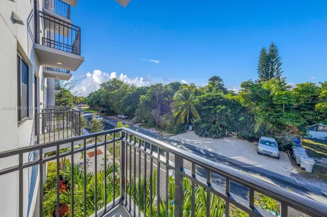 a view of a balcony with an outdoor space