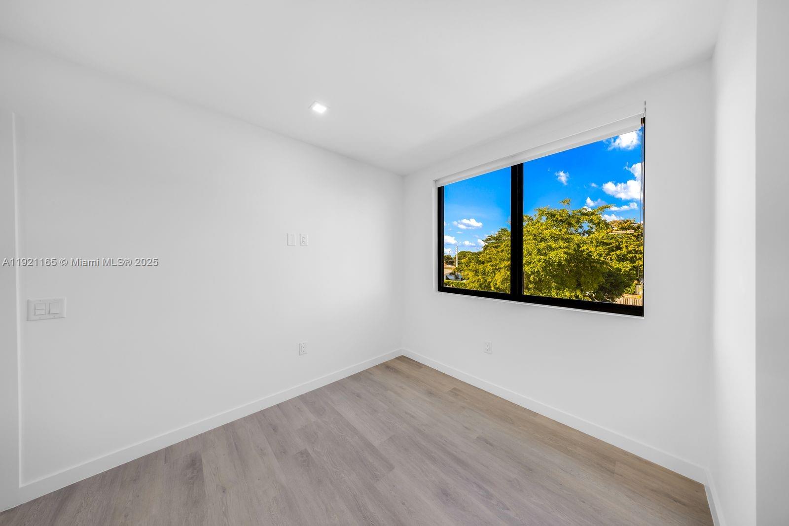 20 Northeast 19th Avenue, Unit 201 Pompano Beach, FL 33060 - Photo 6 of 25 a view of a wall painting on the wall