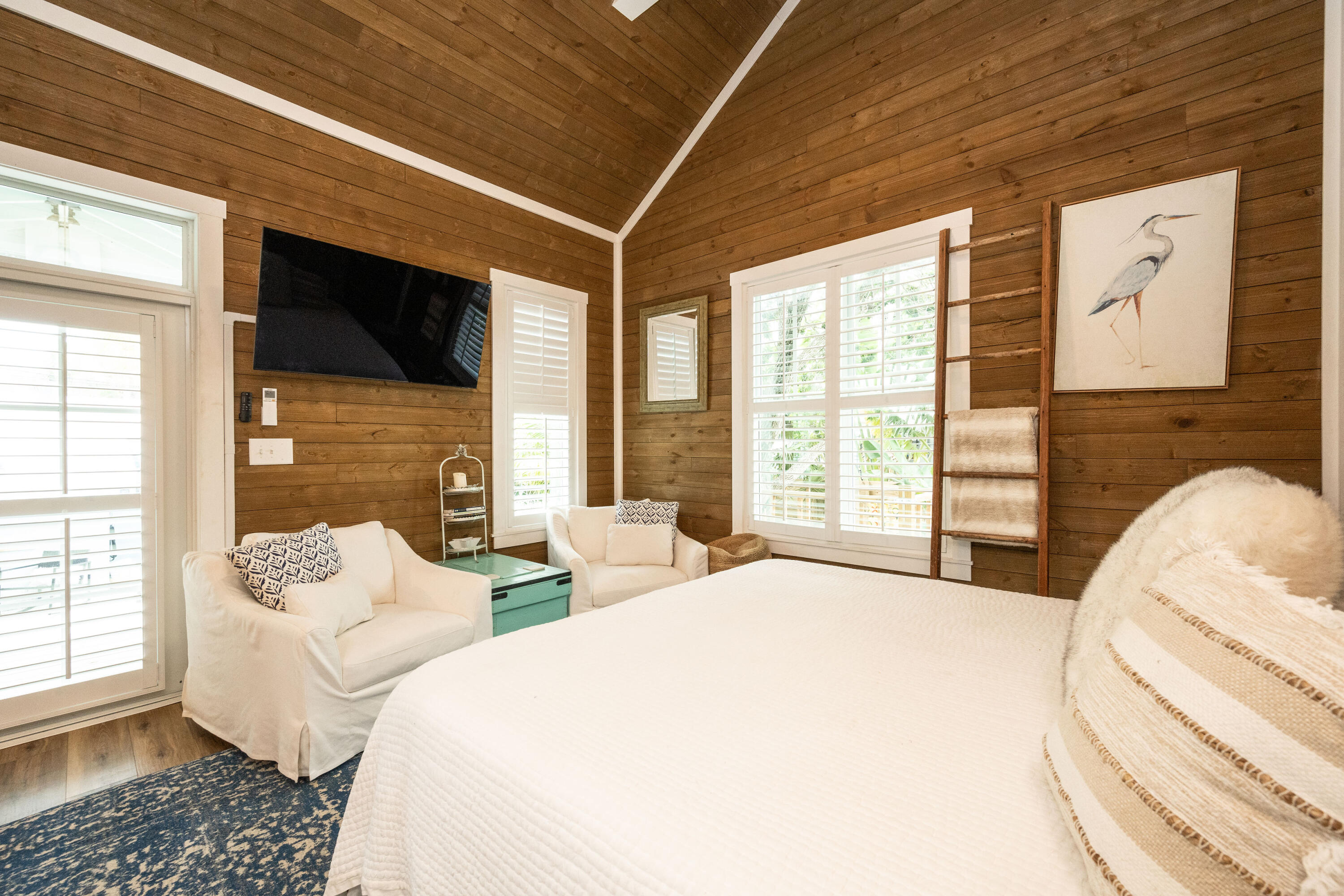 1523 Seminary Street Key West, FL 33040 - Photo 15 of 38 a spacious bedroom with two beds and a large window