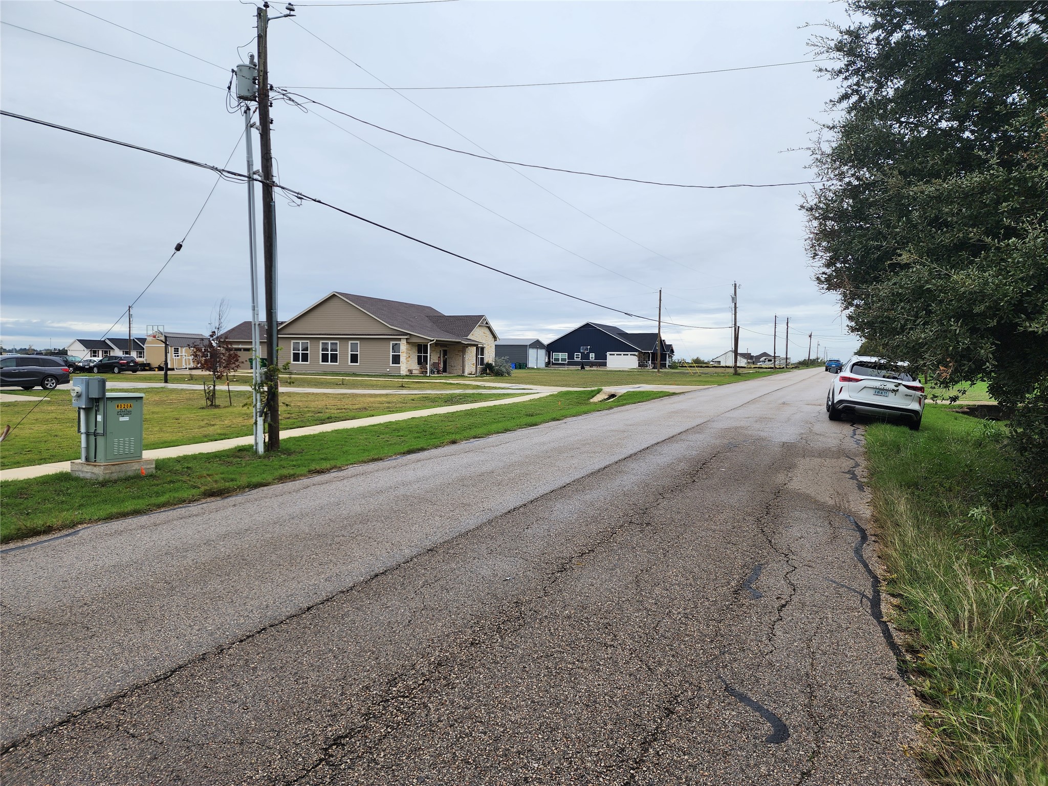 1411 Old Thorndale Road Taylor, TX 76574 - Photo 3 of 9 a view of a road with a big and playing ground