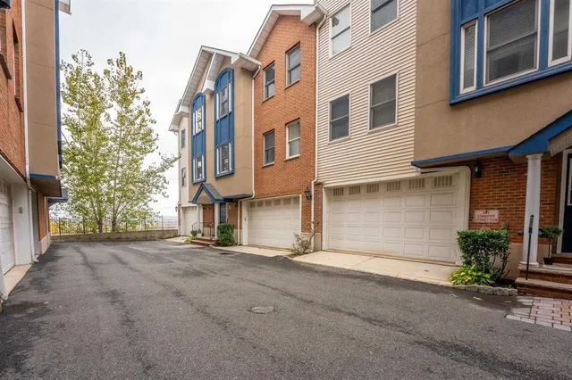a view of a building with a street