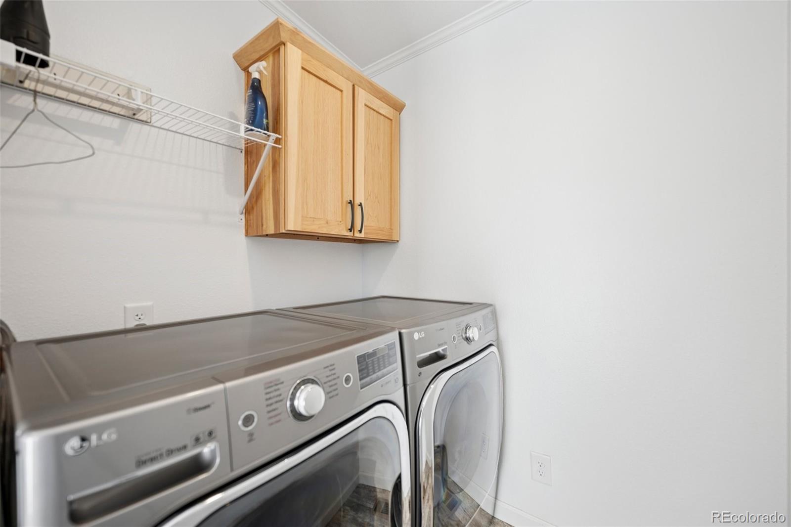311 Silver Street Hugo, CO 80821 - Photo 32 of 33 a utility room with dryer and washer
