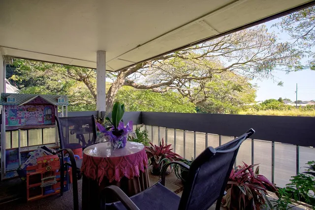 a outdoor dining space with furniture and outdoor view