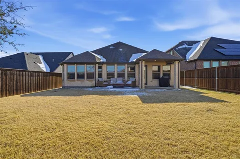 a front view of a house with swimming pool