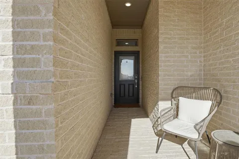 a bathroom with a toilet and a mirror