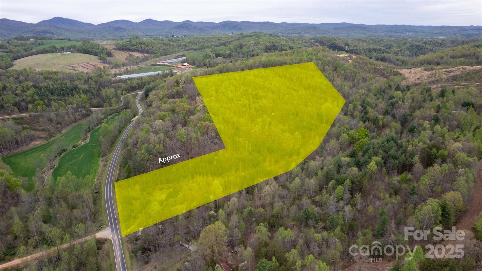 0 Old Vashti Road, Unit 2 Taylorsville, NC 28681 - Photo 21 of 37 a view of a lake with a mountain in the background