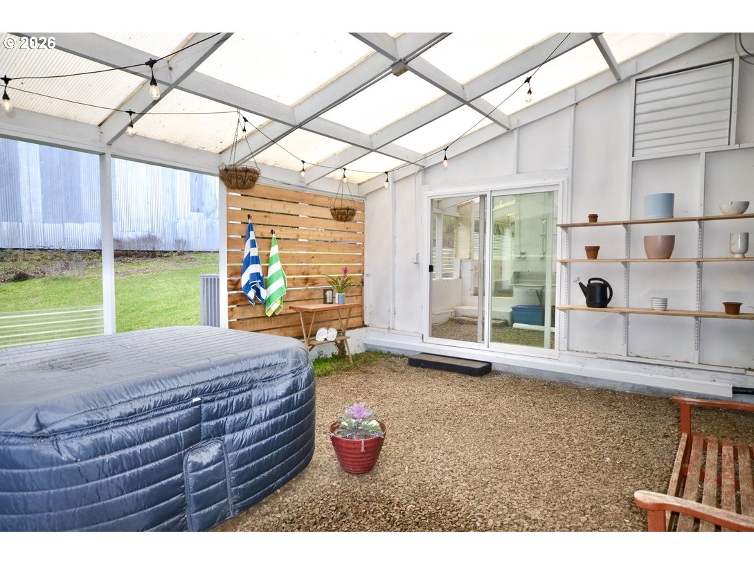 10854 Summit Loop Road Southeast Turner, OR 97392 - Photo 26 of 35 a bed room with a bed and a large window