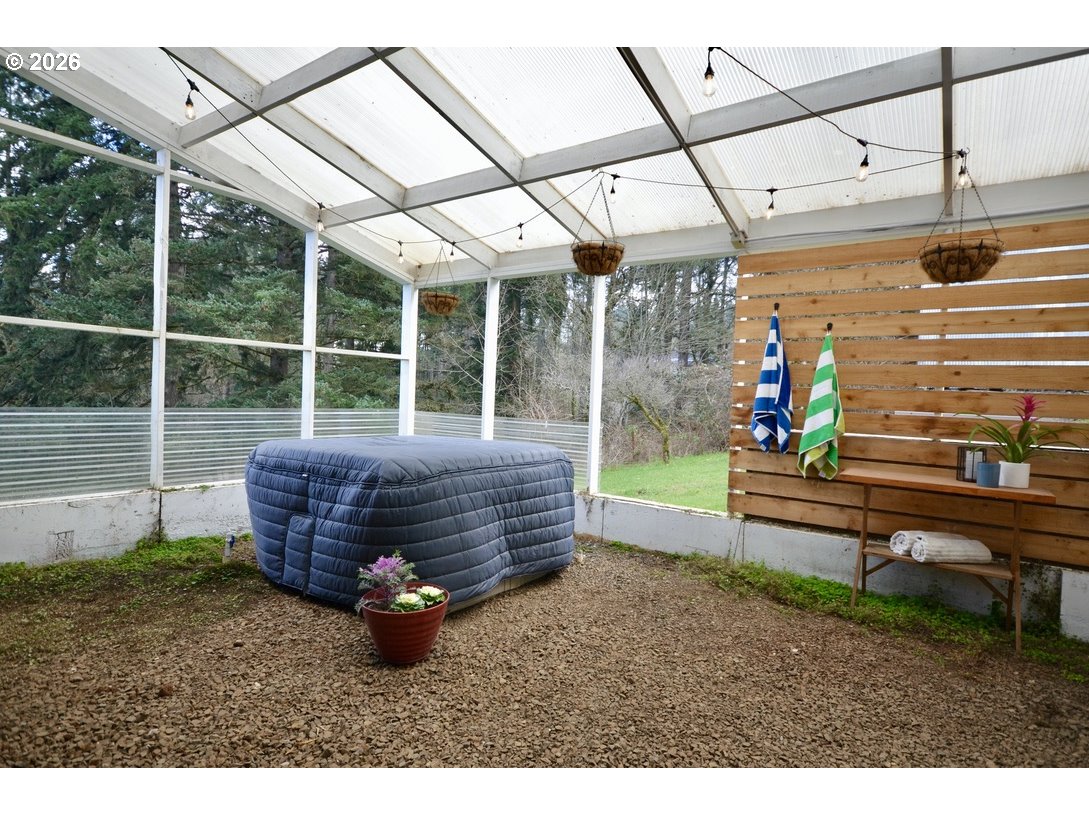 10854 Summit Loop Road Southeast Turner, OR 97392 - Photo 27 of 35 a wooden bench sitting in front of a building