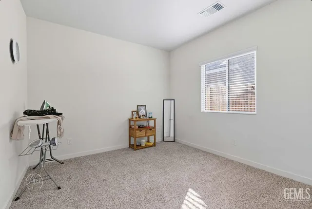 a view of livingroom with furniture and windows