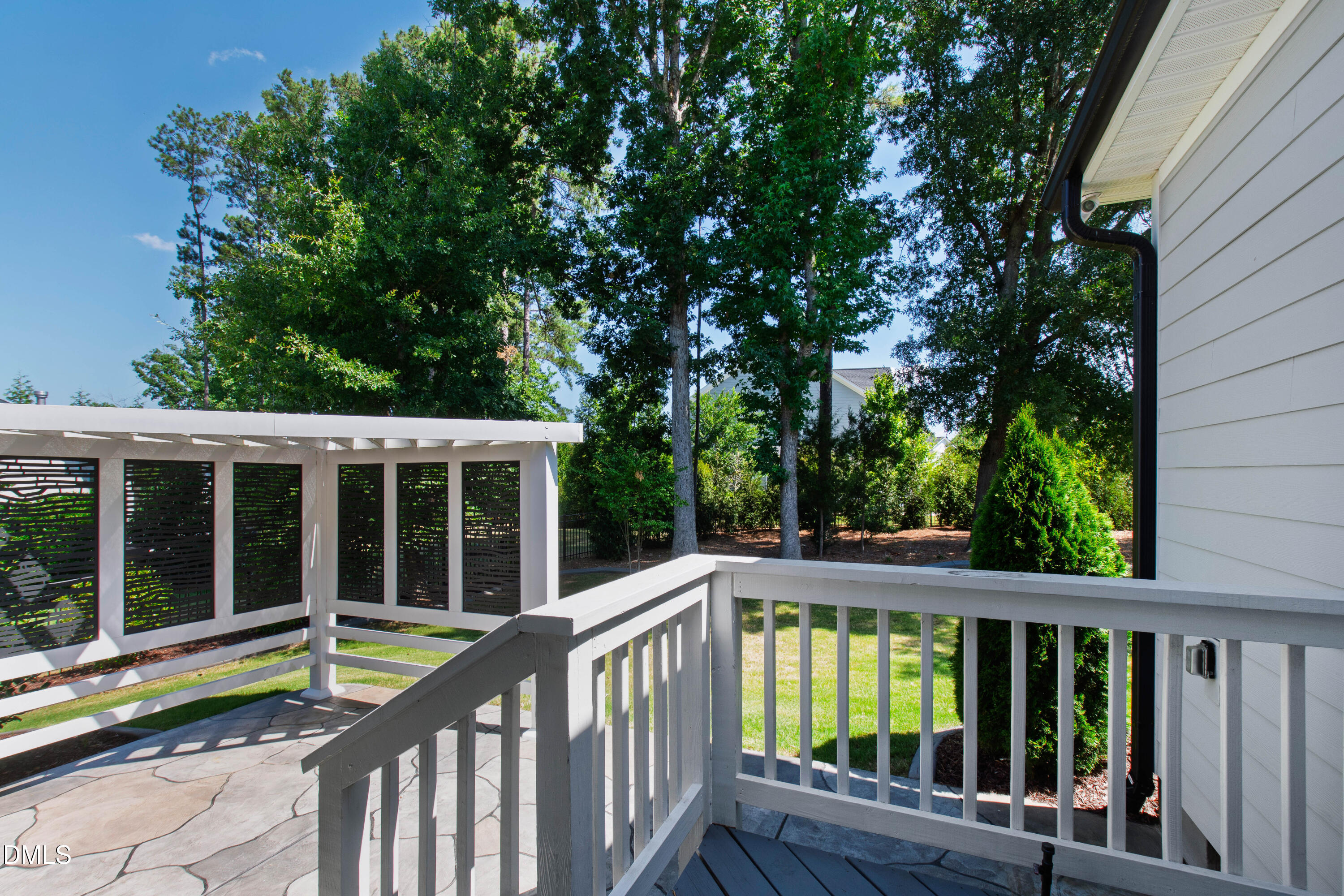 1300 Commons Ford Place Apex, NC 27539 - Photo 57 of 70 a view of a wooden deck and a large window