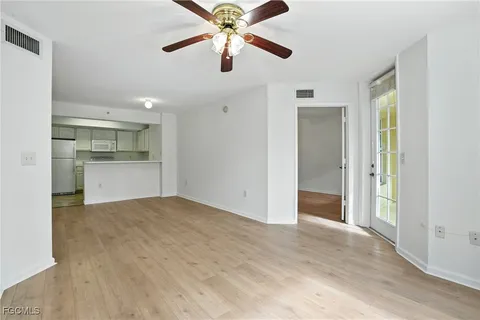 a view of a kitchen with a sink and a kitchen