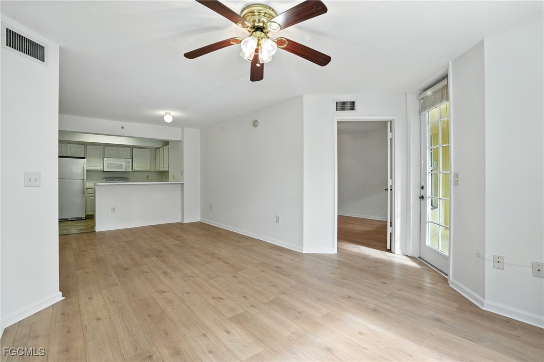 a view of a kitchen with a sink and a kitchen