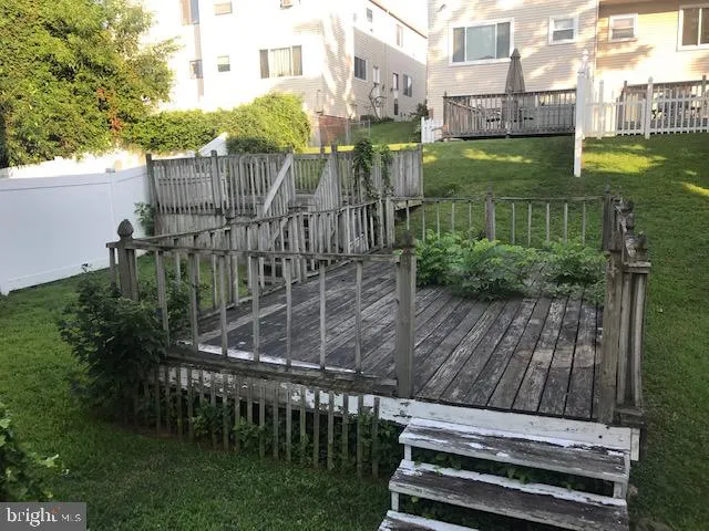 a view of a garden with a lake