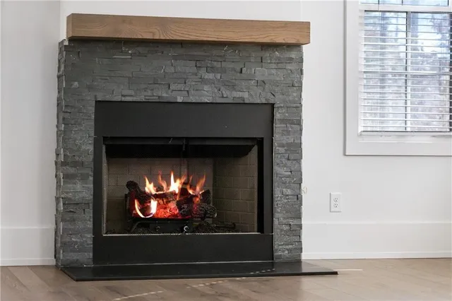 a living room with a fireplace
