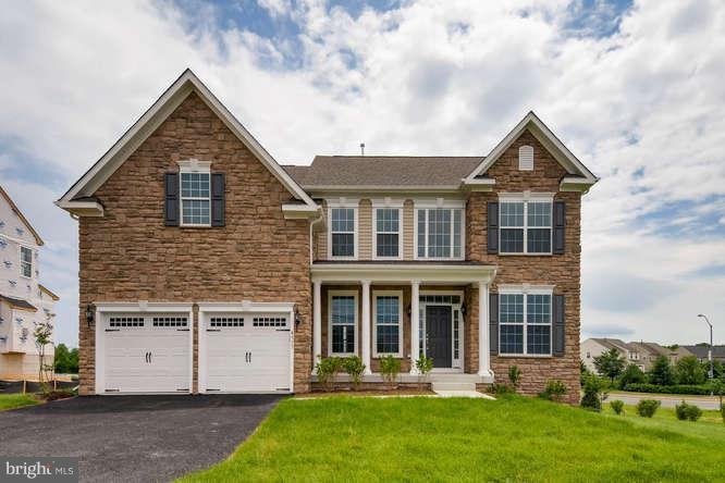 4317 Forge Road Perry Hall, MD 21128 - Photo 1 of 20 a front view of a house with a yard and garage