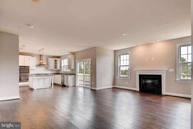 4317 Forge Road Perry Hall, MD 21128 - Photo 7 of 20 a view of a living room with furniture and a fireplace