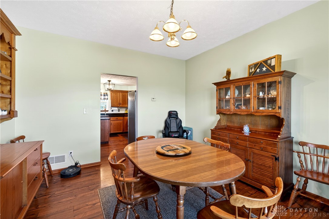 6560 Snyder Road Fletcher, OH 45326 - Photo 9 of 71 This inviting dining room offers a comfortable setting for everyday meals.