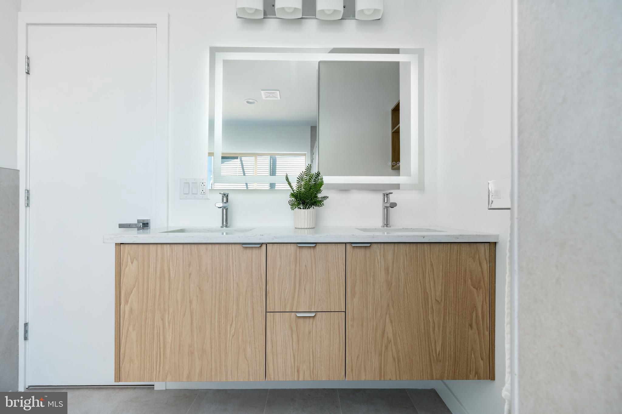 2925 Master Street Philadelphia, PA 19121 - Photo 11 of 41 a bathroom with a sink and a mirror