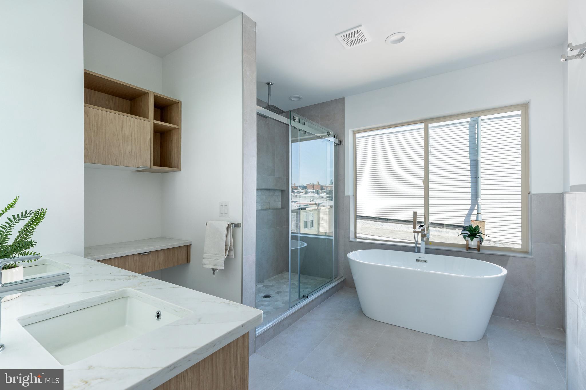 2925 Master Street Philadelphia, PA 19121 - Photo 10 of 41 a bathroom with a bathtub and a sink