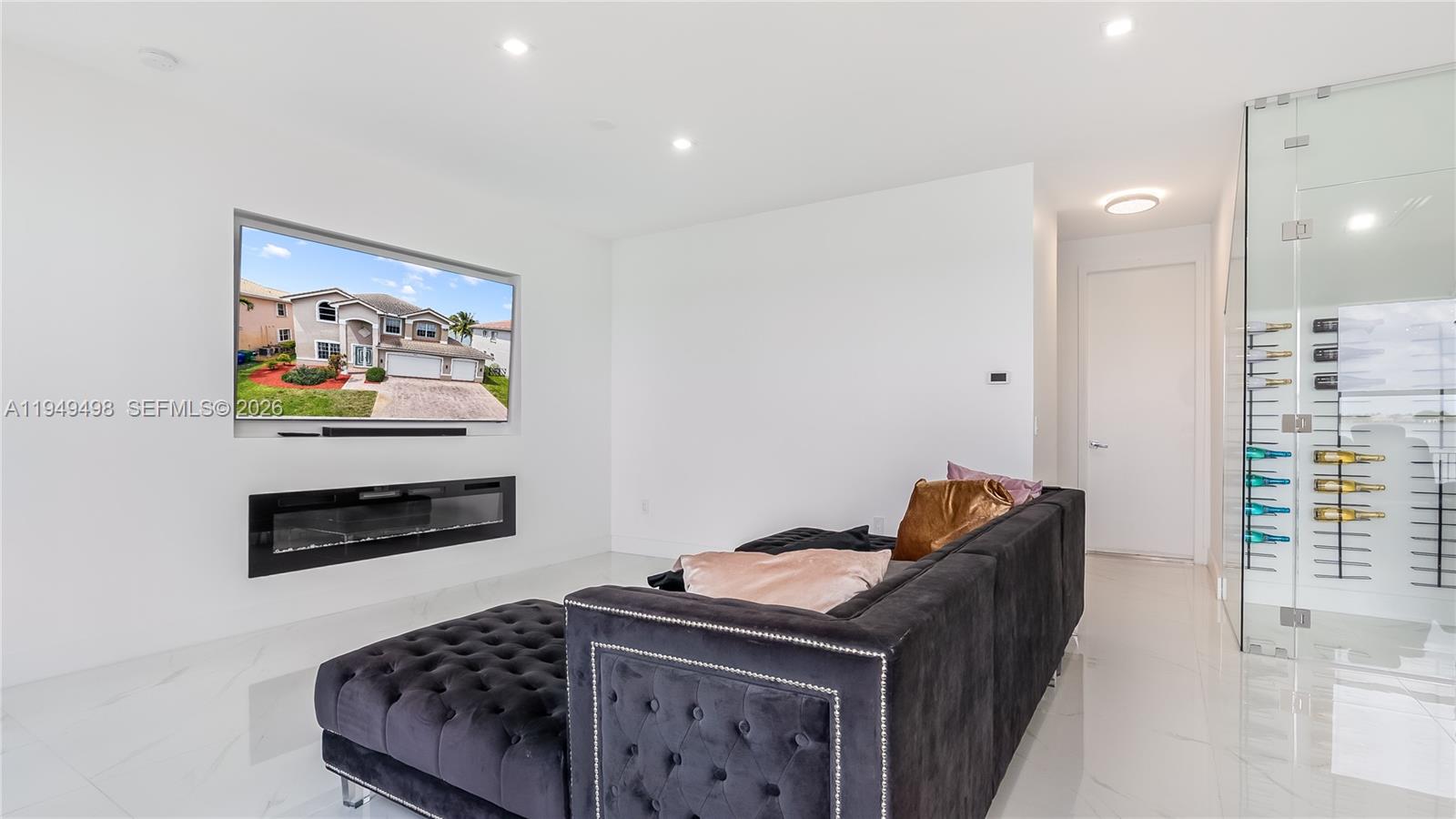 17739 Southwest 54th Street Miramar, FL 33029 - Photo 17 of 47 a living room with furniture and a painting on the wall