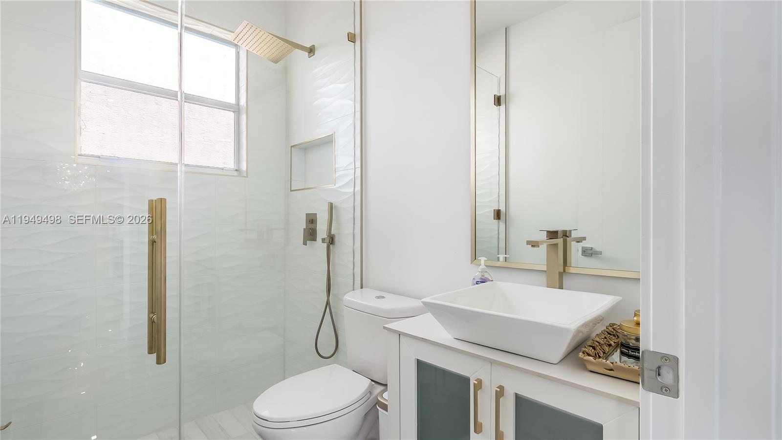17739 Southwest 54th Street Miramar, FL 33029 - Photo 20 of 47 a bathroom with a sink toilet and shower