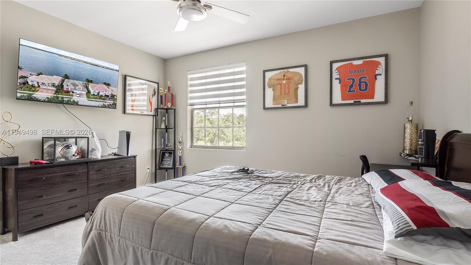 17739 Southwest 54th Street Miramar, FL 33029 - Photo 24 of 47 a bedroom with a bed and a dresser in it