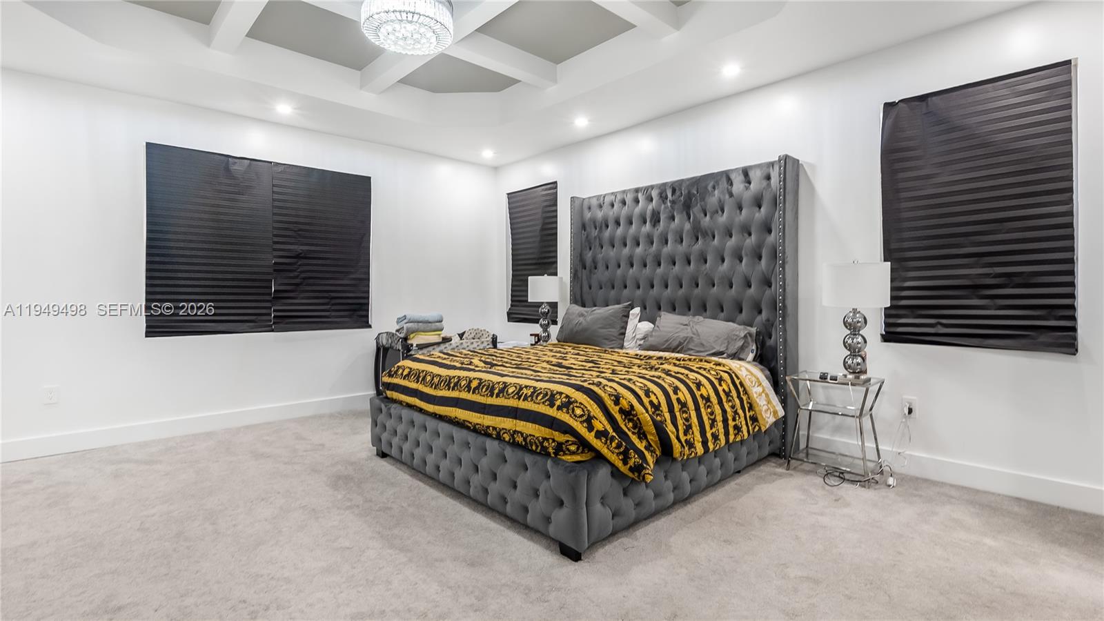 17739 Southwest 54th Street Miramar, FL 33029 - Photo 31 of 47 a bed sitting in a room next to a bathroom