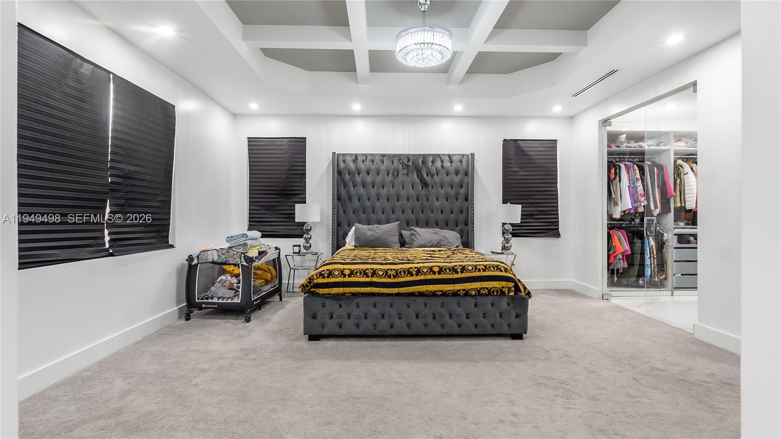 17739 Southwest 54th Street Miramar, FL 33029 - Photo 32 of 47 a spacious bedroom with a bed and a large window