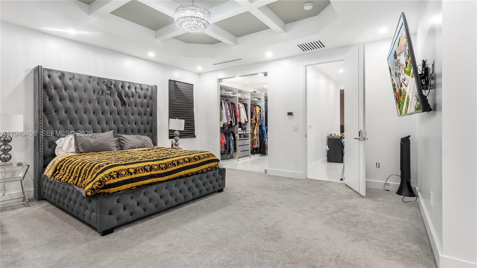 17739 Southwest 54th Street Miramar, FL 33029 - Photo 33 of 47 a spacious bedroom with a bed and a walk in closet