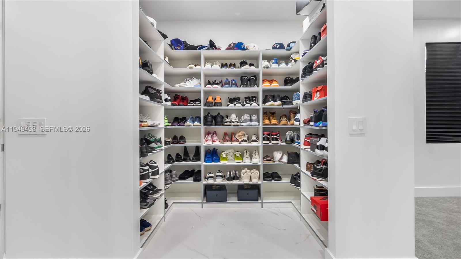 17739 Southwest 54th Street Miramar, FL 33029 - Photo 37 of 47 a room with lots of white walls and a potted plant