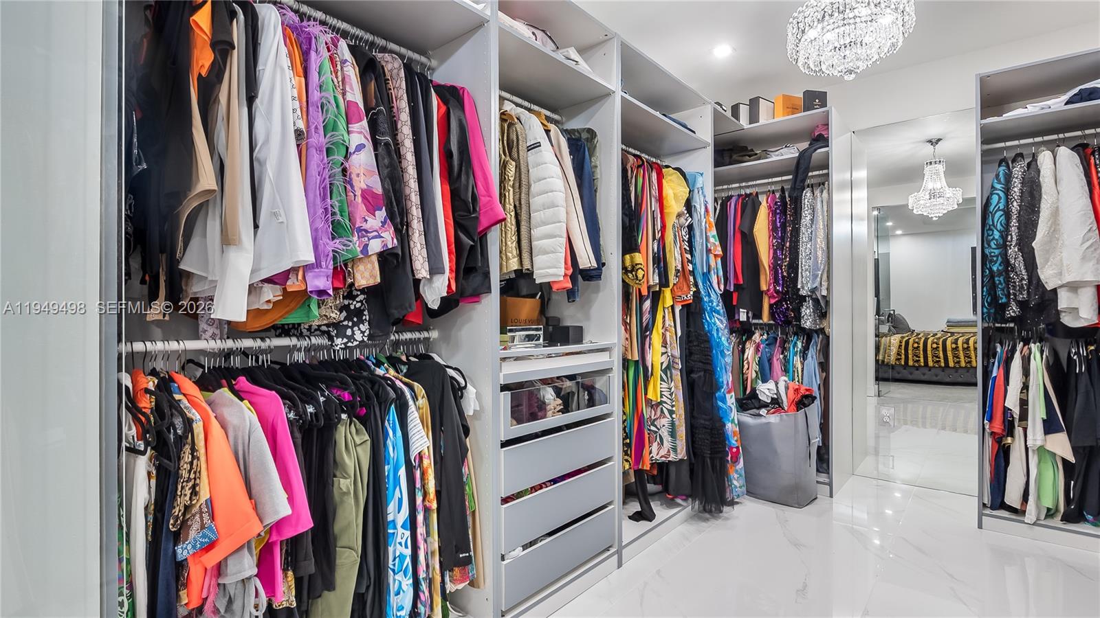 17739 Southwest 54th Street Miramar, FL 33029 - Photo 38 of 47 a view of walk in closet with clothes