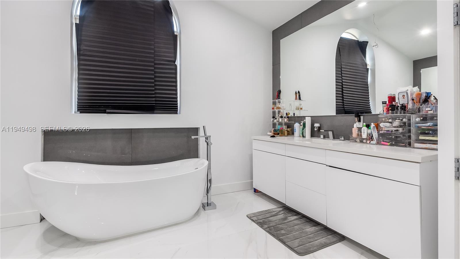 17739 Southwest 54th Street Miramar, FL 33029 - Photo 40 of 47 a bathroom with a bathtub and a sink