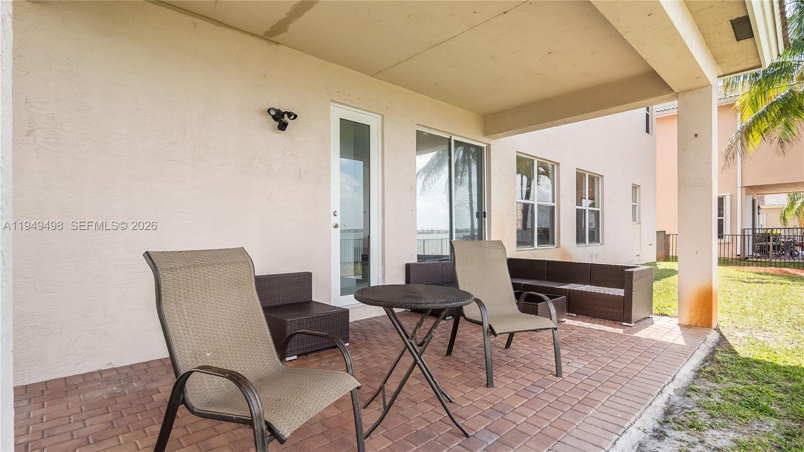 17739 Southwest 54th Street Miramar, FL 33029 - Photo 42 of 47 a view of a livingroom with furniture and a window