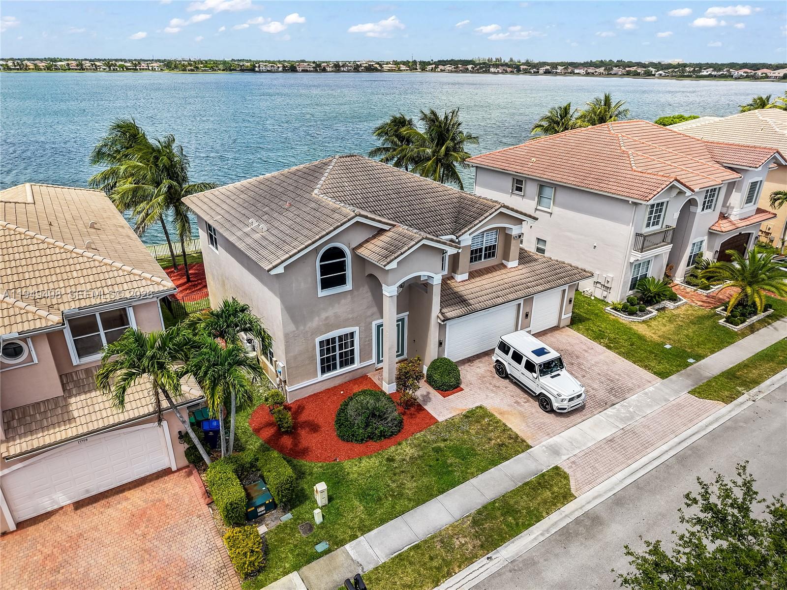 17739 Southwest 54th Street Miramar, FL 33029 - Photo 46 of 47 an aerial view of a house with garden space and ocean view