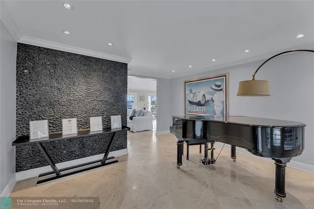 a kitchen with stainless steel appliances granite countertop a refrigerator and a stove