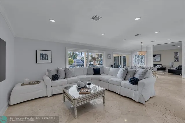 a living room with furniture and a couch