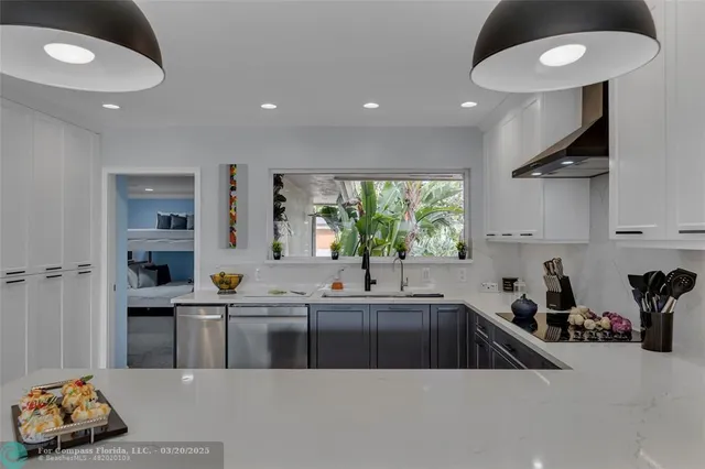 a bathroom with a sink and a shower