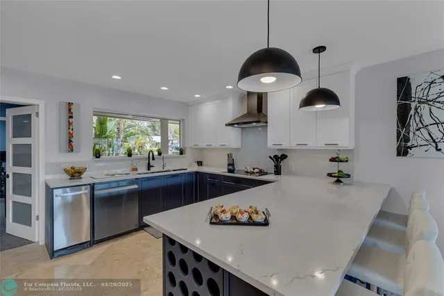 a bathroom with a sink double vanity and a mirror