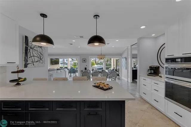 a view of a patio with couches table and chairs