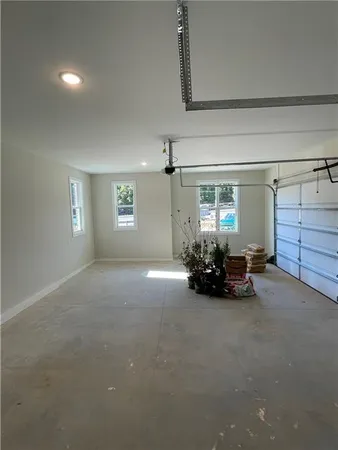 a view of a livingroom with furniture and a chandelier