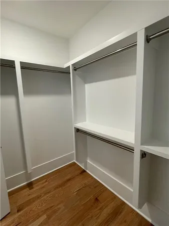 a view of an empty walk in closet