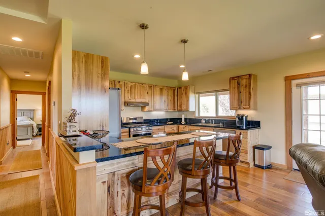 a kitchen with lots of counter space furniture and appliances