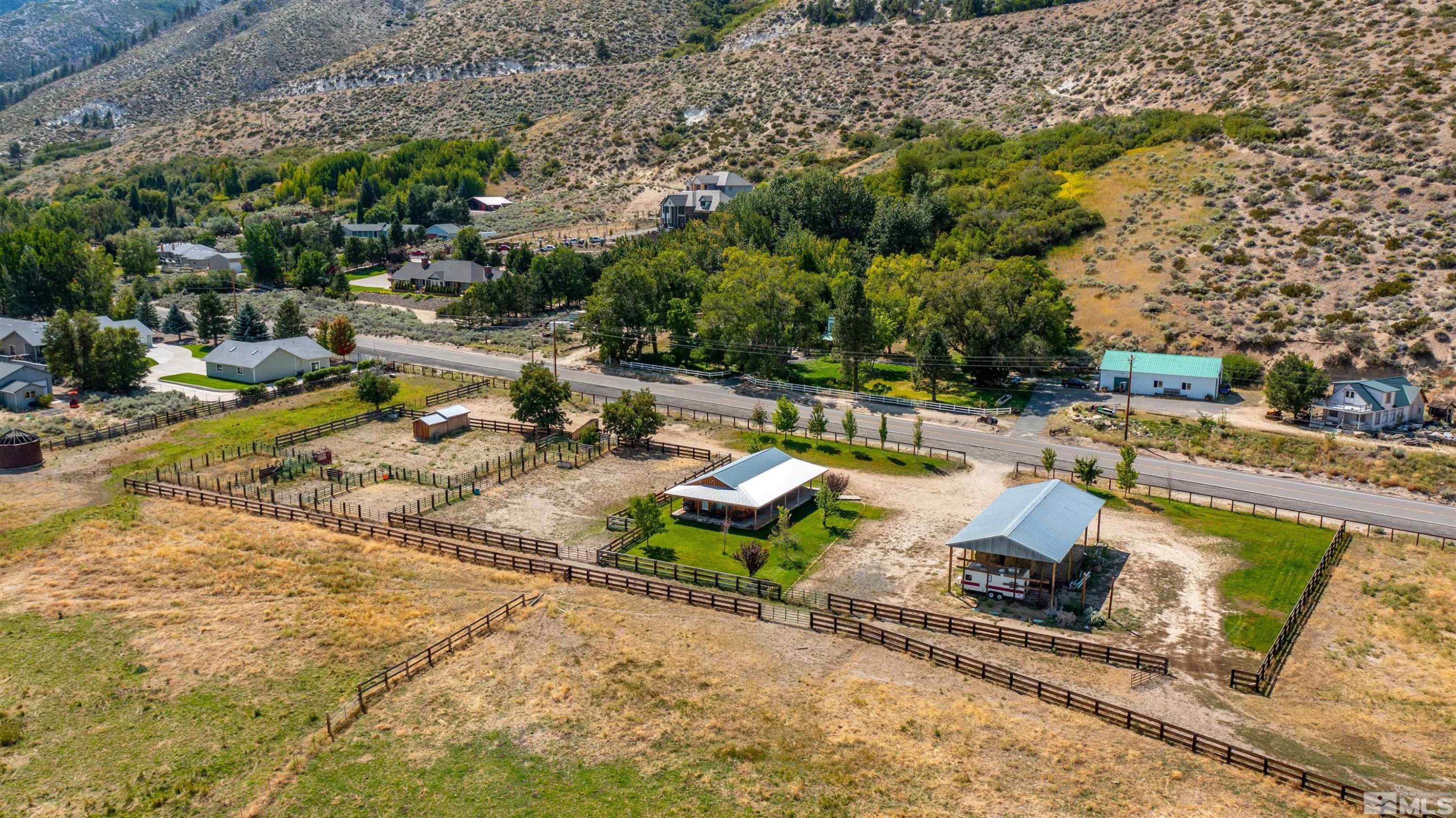 1461 Foothill Road Gardnerville, NV 89460 - Photo 6 of 39 an aerial view of a swimming pool and lounge chair