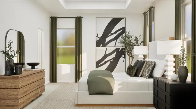 a bedroom with furniture and a mirror